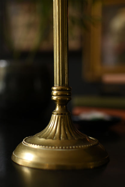 Gold candle stick with fluted edge