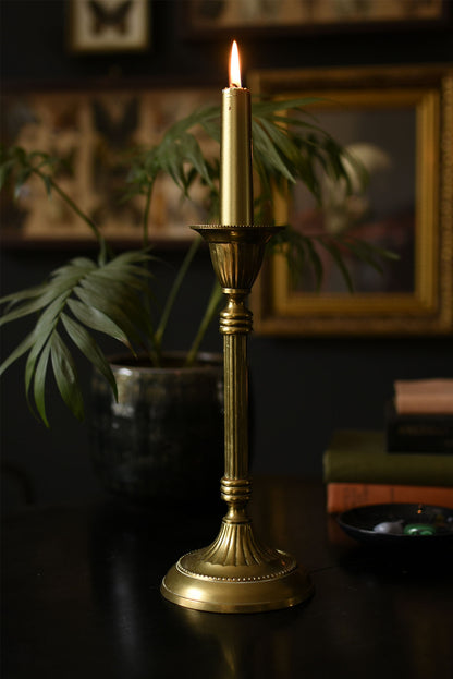 Gold candle stick with fluted edge