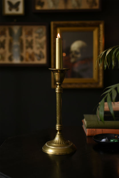 Gold candle stick with fluted edge